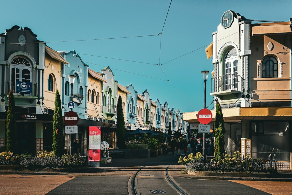 a street with a train track going through it